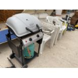 AN OUTBACK GAS BBQ AND A WHITE PLASTIC TABLE WITH FOUR CHAIRS