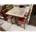 AN OAK DRAW LEAF DINING TABLE AND FOUR CHAIRS