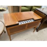 A MARCONIPHONE RADIOGRAM WITH RECORD DECK IN A TEAK CABINET