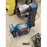 A CLARKE METAL WORKER 6 INCH BENCH GRINDER WITH SANDING BELT IN WORKOING ORDER