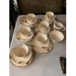 A PAREEK JOHNSON BROTHERS SIX TRIO CUPS AND SAUCERS AND SIDE CAKE PLATE