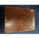 A WOODEN BED SERVING TRAY
