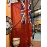 A LARGE NAVEL ENSIGN FLAG APPROXIMATE MEASUREMENT 45 INCHES X 75 INCHES