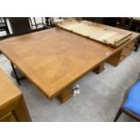 A CHERRY WOOD EXTENDING DINING TABLE