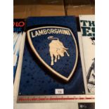 A LAMBORGHINI METAL ADVERTISING SIGN