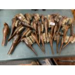 A LARGE COLLECTION OF BRUSHES WITH WOODEN BIRD CARVING BACKS/HANDLE