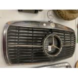 A MERCEDES CHROME CAR GRILL