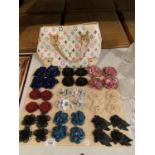 EIGHTEEN PAIRS OF FLORAL SHOE CLIPS AND A HANDBAG