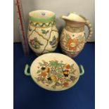 THREE ITEMS OF CHARLOTTE RHEAD CROWN DUCAL TO INCLUDE TWO VASES AND A TWIN HANDLES DISH, ALL A/F