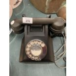 A BLACK BAKELITE TELEPHONE