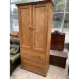A MODERN TEAK BEDROOM CABINET WITH TWO DOORS AND TWO DRAWERS - DOOR NEEDS SCREWING ON