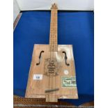 A 'BBG BLUES BOX GUITAR NO 5' SQUARE THREE STRING UKULELE