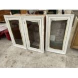 THREE RECESSED PAINTED MAHOGANY WALL CABINETS