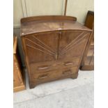 AN OAK ART DECO STYLE CABINET WITH TWO DOORS AND TWO DRAWERS