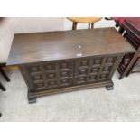 A YOUNGER TOLEDO OAK SIDEBOARD WITH TWO DOORS