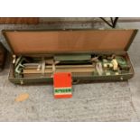 A SINGER KNITTING MACHINE IN A CASE