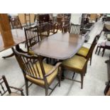 A MAHOGANY EXTENDING DINING TABLE WITH FOUR DINING CHAIRS AND TWO CARVERS