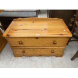 A PINE CHEST OF TWO DRAWERS