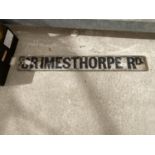 A VINTAGE CAST IRON GRIMESTHORPE RD SIGN