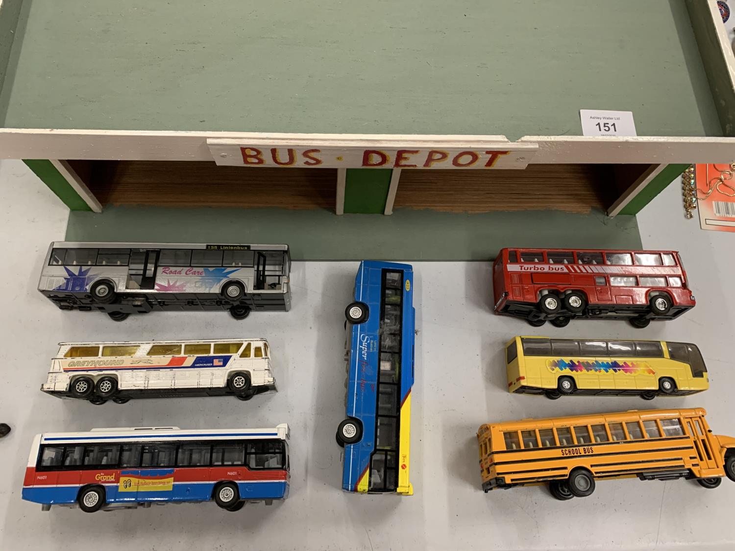 A WOODEN BUS DEPOT WITH SEVEN BUSES - Image 2 of 3