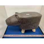 A FAUX LEATHER HIPPO FOOTSTOOL