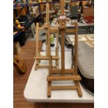 TWO WOODEN EASELS