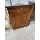 A GEORGIAN OAK FLAT FRONT CORNER CUPBOARD WITH ONE DOOR AND LOWER DRAWER