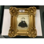 A HEAVY GILT FRAMED PICTURE OF A GENTLEMAN