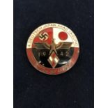 WWII GERMAN ENAMEL BADGE DATED 1942