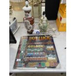 A FRUIT MACHINE PANEL AND TWO TABLE LAMPS