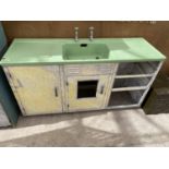 A VINTAGE GREEN ENAMEL AND ALUMINIUM KITCHEN SINK UNIT