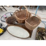 THREE LARGE WICKER BASKETS, A TEA CHEST AND AN OVAL WOODEN FRAMED MIRROR