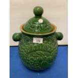 A LARGE GREEN WEST GERMAN RUMTOPF JAR WITH LID