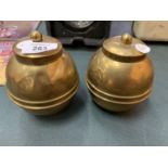 A PAIR OF BRASS LIDDED POTS