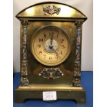 A LATE 19TH CENTURY BRASS CLOCK MOUNT AND DIAL WITH ART NOUVEAU COLOURED FLORAL ENAMEL DECORATION