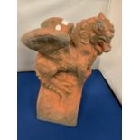 A TERRACOTTA ROOF FINALE OF A DRAGON DECORATION- 39CM TALL