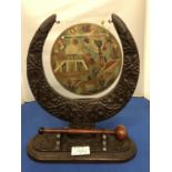 AN ANGLO INDIAN CARVED CRESCENT MOON TABLE GONG, WITH BRONZE HAND PAINTED TEMPLE AND LANDSCAPE