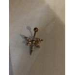 A SILVER MARKED BUTTERFLY BELLY BUTTON BAR