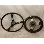 TWO VINTAGE STEERING WHEELS