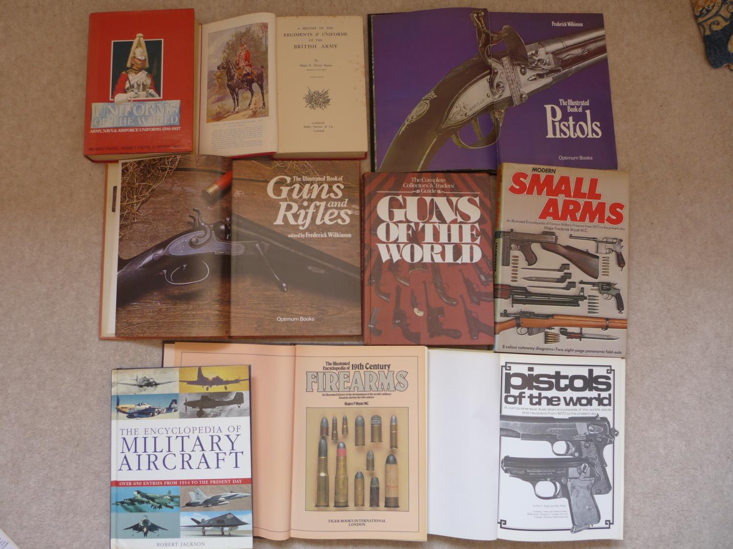 NINE BOOKS ON GUNS AND REGIMENTAL UNIFORMS