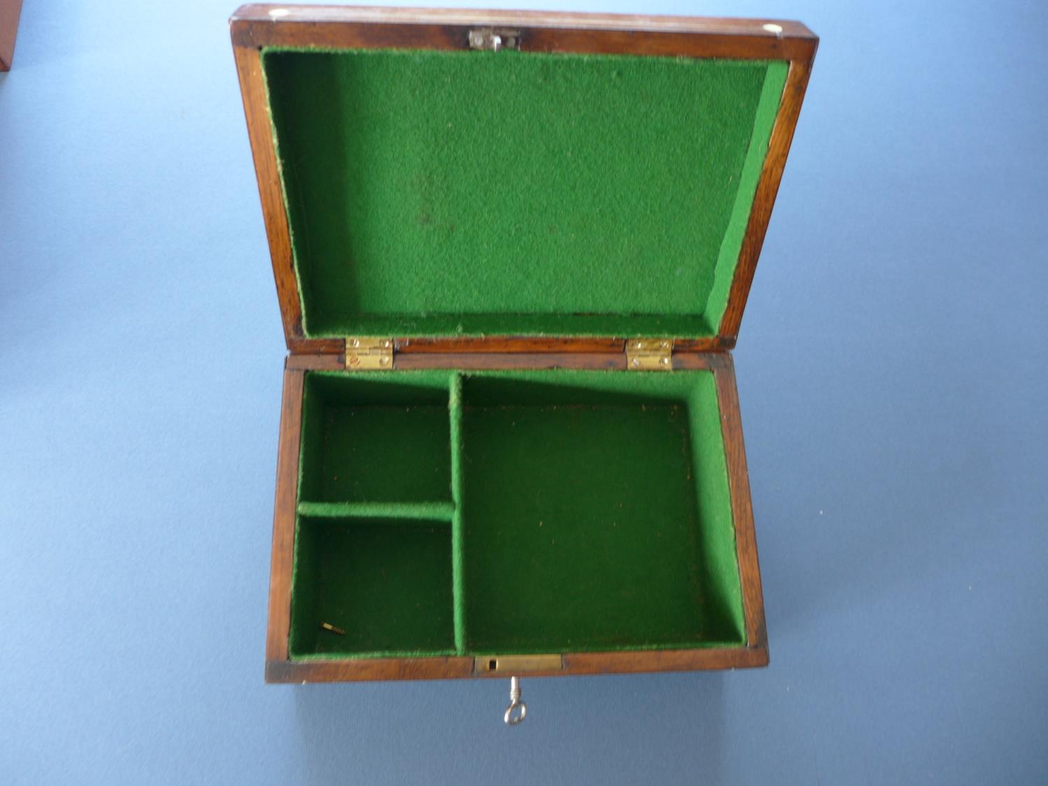 A ROSEWOOD VENEERED BOX WITH FITTED INTERIOR