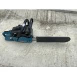 A MAKITA DCS 520 PETROL CHAIN SAW - IN GOOD CONDITION AND WORKING ORDER