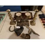 A COLLECTION OF BRASSWARE TO INCLUDE CANDLESTICKS AN IRON, CLOCK BAROMETER ETC