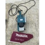 A MAKITA 9920 76 X 210 MM 240 VOLT BELT SANDER - IN WORKING ORDER