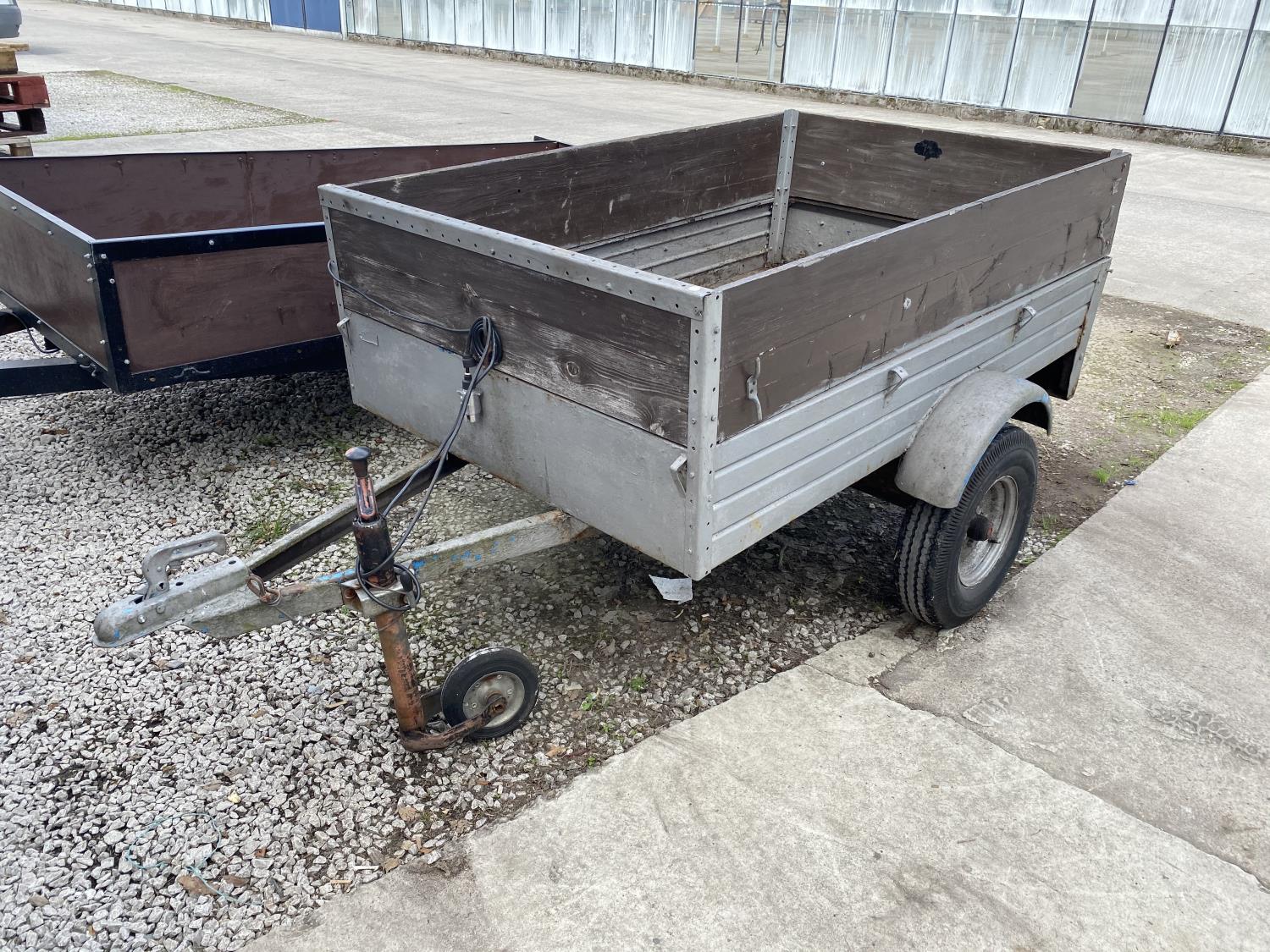 A GREY PAINTED CAR TRAILER