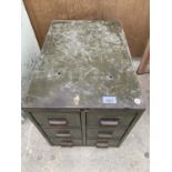 A VINTAGE GREEN METAL SIX DRAWER FILING CABINET