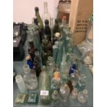 A LARGE COLLECTION OF VINTAGE BOTTLES