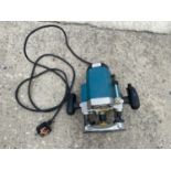 A MAKITA 3612 240 VOLT ROUTER WITH PERFORM BLADE - IN WORKING ORDER