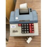 A VINTAGE PRECISA ELECTRIC ADDING MACHINE - IN WORKING ORDER