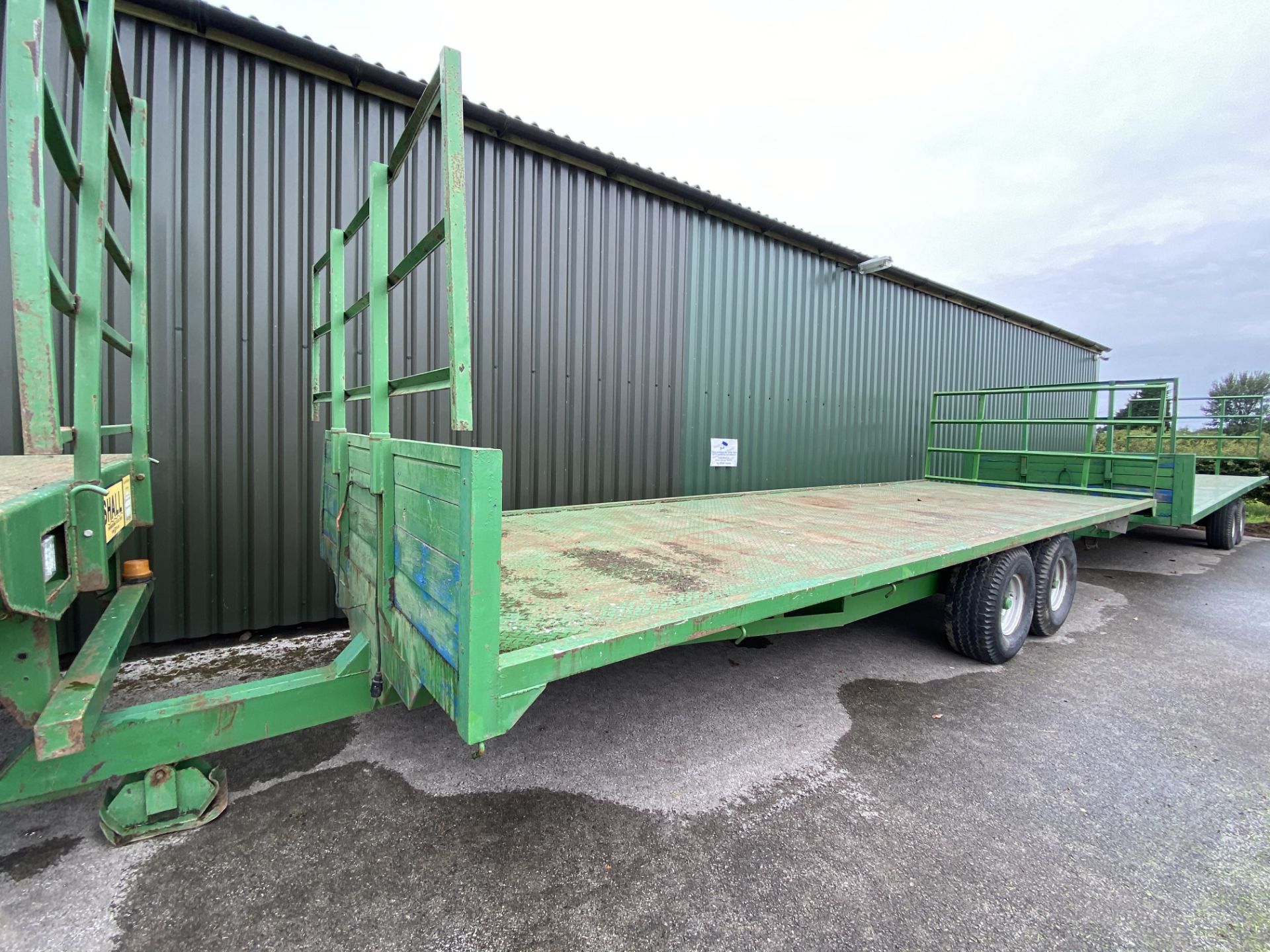 A 24 FOOT TANDEM AXLE BALE TRAILER WITH CHEQUER PLATE FLOORS AND ON 12.5/80 15.3 14PLY TYRES